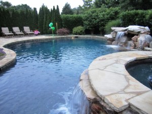 Backyard Pool & Landscaped Garden Ideas for Main Line Outdoor Living Area 